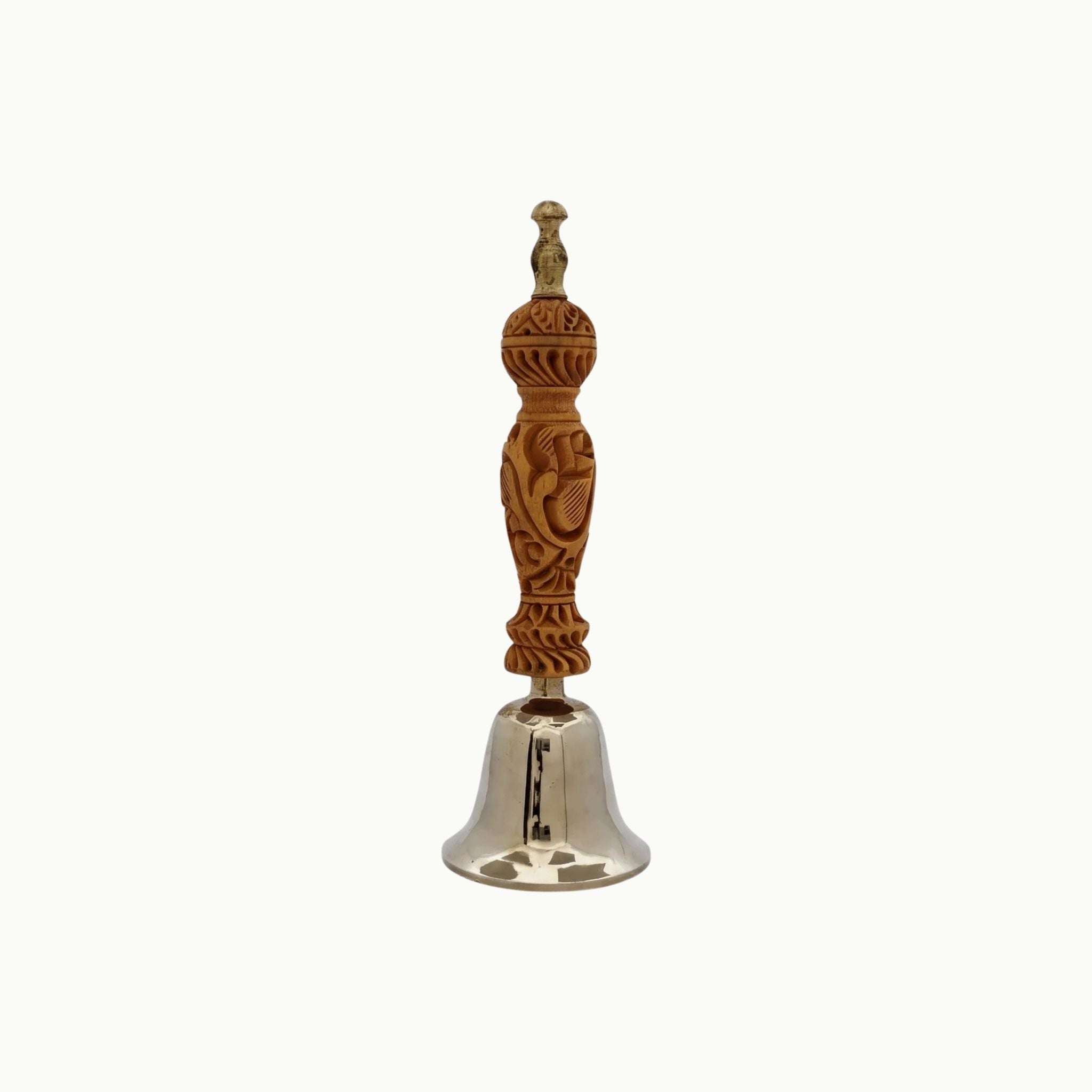 A small decorative bell with an ornate carved wooden handle and a polished silver-tone metal bell base, centered on a plain white background.