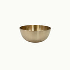 Bronze bowl with a blue rim on a white background