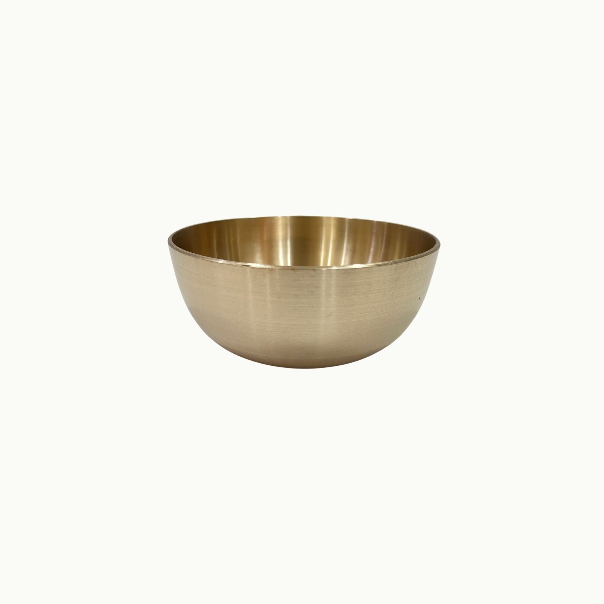 Bronze bowl with a blue rim on a white background